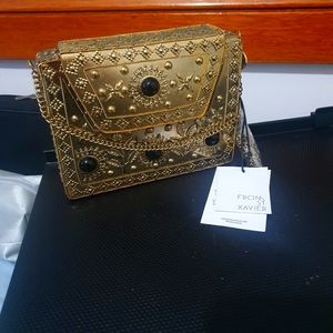 From St Xavier Elmie Metal Clutch Bag